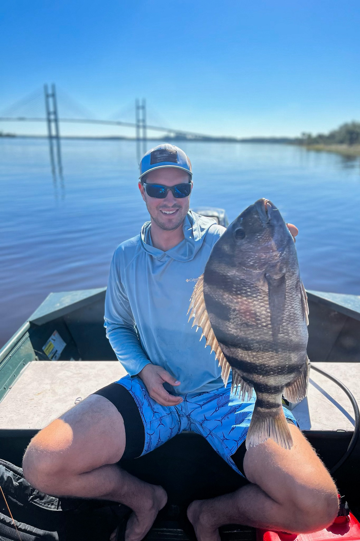 Photo of me holding a sheepshead on a boat. 