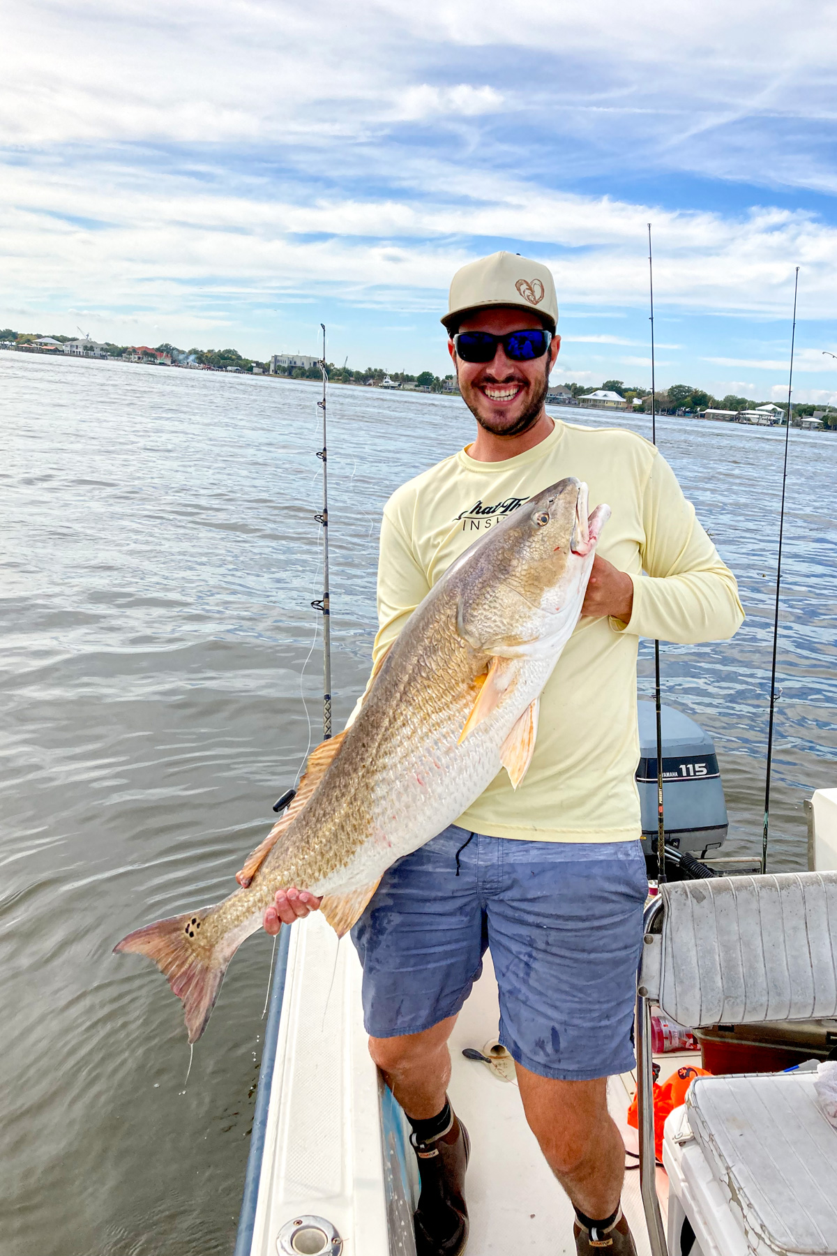 a giant bull red fish caught with live shrimp inshore