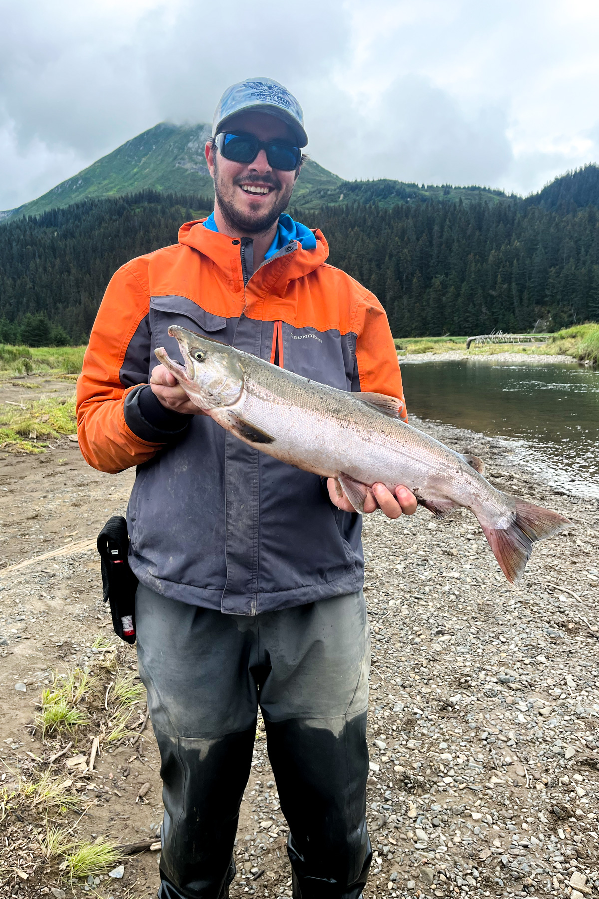 me with a silver salmon in a remote creek in alaska 